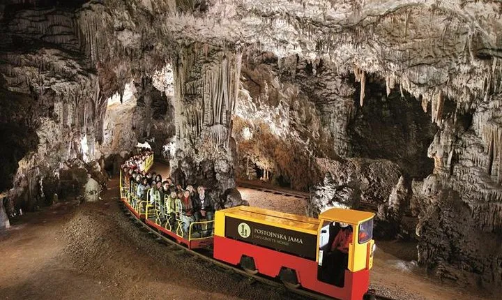 Postojna Cave & Predjama Castle from Trieste