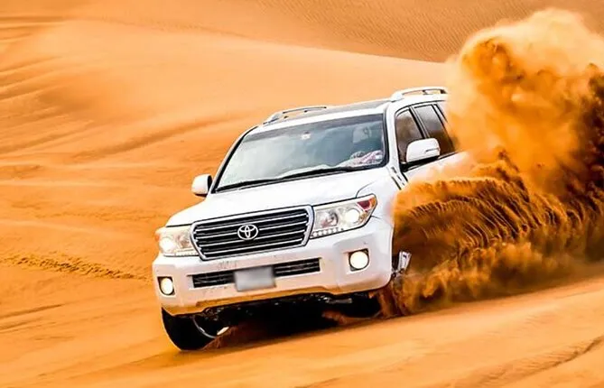 Evening Desert Safari Dubai with Camel Riding and BBQ Buffet Dinner