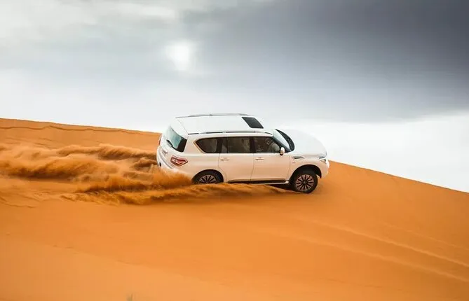 Dubai Desert Safari Dune Bashing, Camel Ride, Sand Boarding, BBQ Dinner.