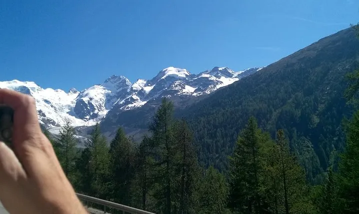 Bernina train and Swiss Alps. Departure from Desenzano