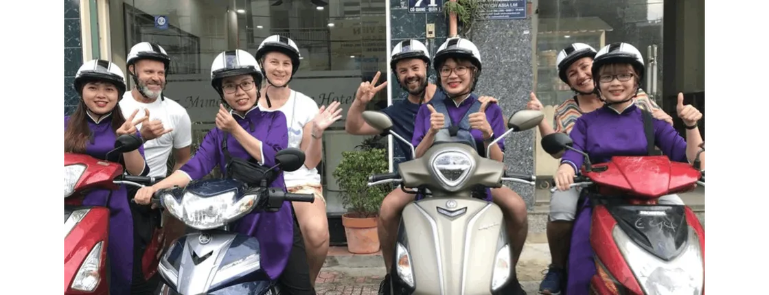 Ho Chi Minh City scooter food tour by night with a local host