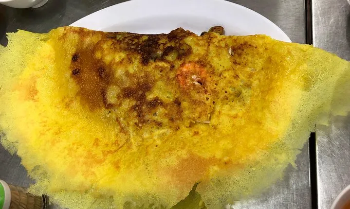 Saigon By Night and Street Food By Motorbike |Opt: Ao Dai Riders