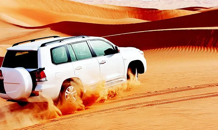 Red Dunes Safari with Sandboarding & Camel Ride from Ras Al Khayma