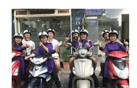 Ho Chi Minh City scooter food tour by night with a local host