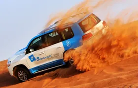 Abu Dhabi: Desert Safari with BBQ, Camel Ride & Sandboarding