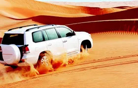 Red Dunes Safari with Sandboarding & Camel Ride from Ras Al Khayma
